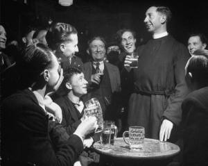 Priest-drinking-in-a-pub-during-a-revival-of-the-Church-of-England